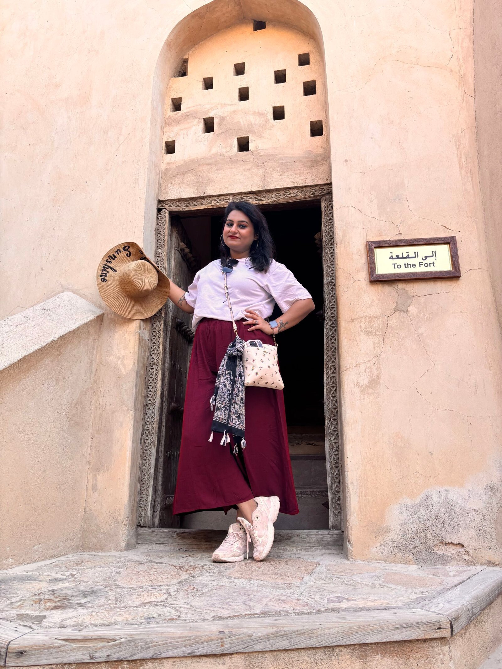 woman dressing modestly while traveling in oman