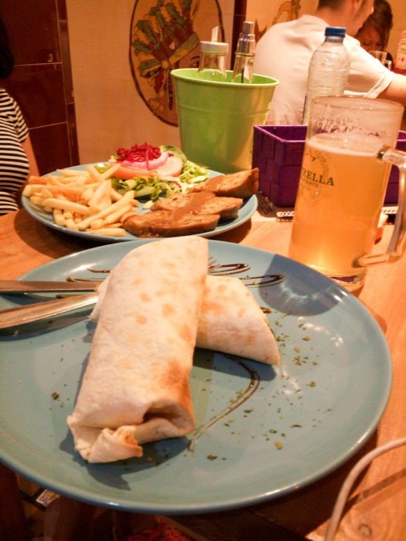 Local dinner in Madrid with Lemon beer.