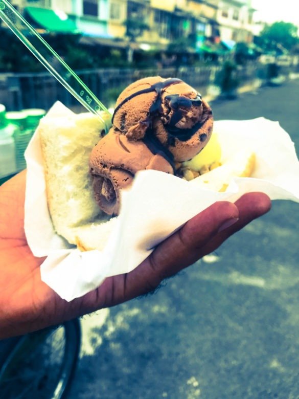 Ice cream sandwich in bread in Bangkok market