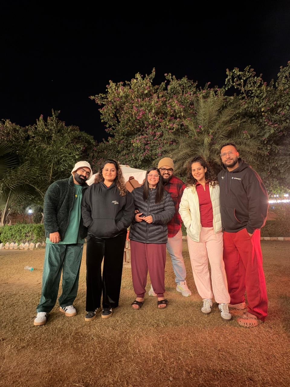 friends traveling together in india at night